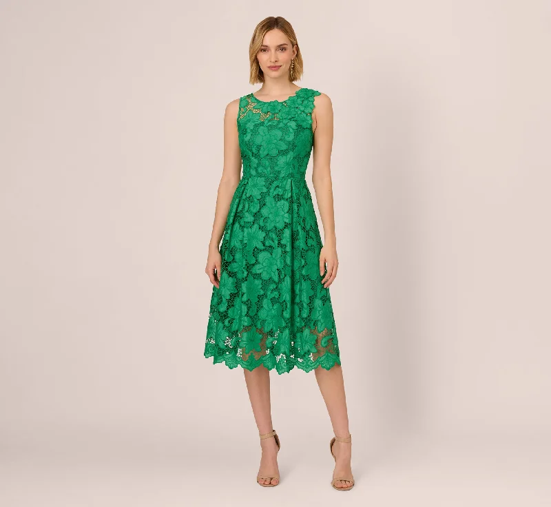 Wrap - style midi dresses in silk for a sophisticated office look Lace Sleeveless Midi Dress With Sheer Neck And Hem In Green