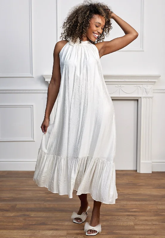 Midi dresses with pleated skirts for a timeless and elegant appeal Angeleye Halterneck Midi Dress With Rose Detail In Cream Midi dresses with pleated skirts for a timeless and elegant appeal Angeleye Halterneck Midi Dress With Rose Detail In Cream