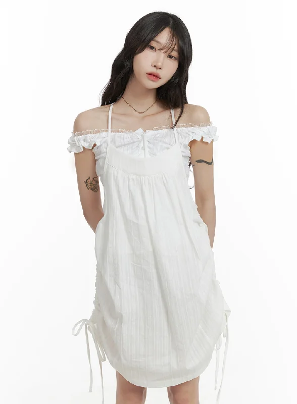 Mini dresses with tassel accents for a fun touch Cotton String Cami Mini Dress CA408