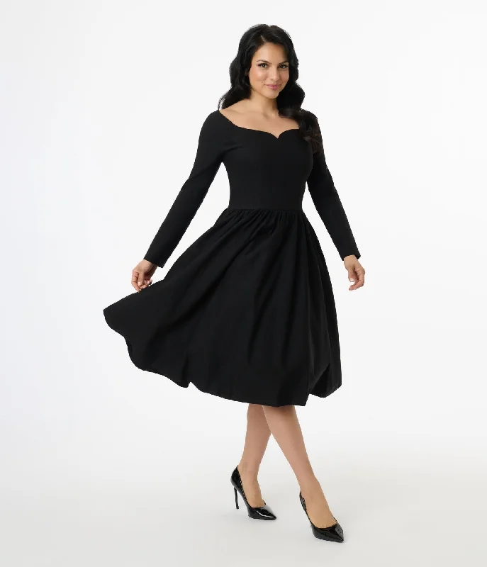 Everyday Dress with Tiered Skirt for a Voluminous Look​ Unique Vintage 1950s Solid Black Sweetheart Swing Dress