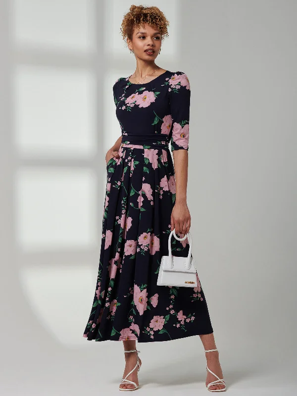 Midi dresses with keyhole backs for a flirty and unexpected detail Goldie 3/4 Sleeve Jersey Maxi Dress, Navy Floral Midi dresses with keyhole backs for a flirty and unexpected detail Goldie 3/4 Sleeve Jersey Maxi Dress, Navy Floral