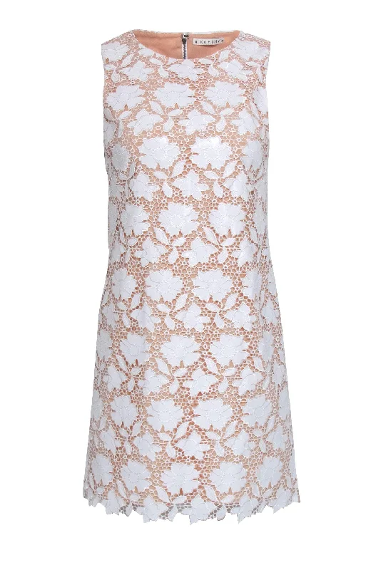 Lace - Embellished Women Dress for an Elegant and Sophisticated Appearance Lace - Embellished Women Dress for an Elegant and Sophisticated Appearance Alice & Olivia - White Faux Leather Eyelet Lace Dress Sz 4