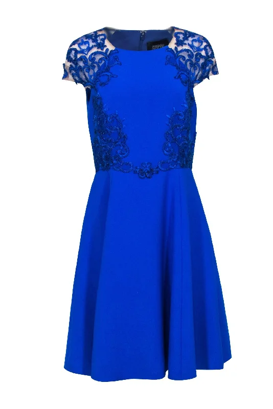 Little Black Women Dress with Sequins for a Glamorous Night Out Little Black Women Dress with Sequins for a Glamorous Night Out Marchesa Notte - Cobalt Blue Beaded Embroidery Cap Sleeve Dress Sz 8