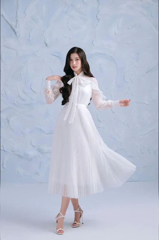 Midi dresses with bow accents for a sweet and charming lookOrchid Pleated Cuff Sleeved Organza Midi Dress