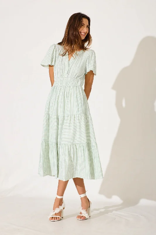 Midi dresses with fringe details for a fun and energetic stylePalm Springs Midi Dress In Pale Green And White Stripe
