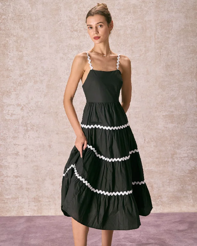 Midi dresses with polka dot prints for a playful summer outfitThe Black Contrast Wave Cut Strap Midi Dress