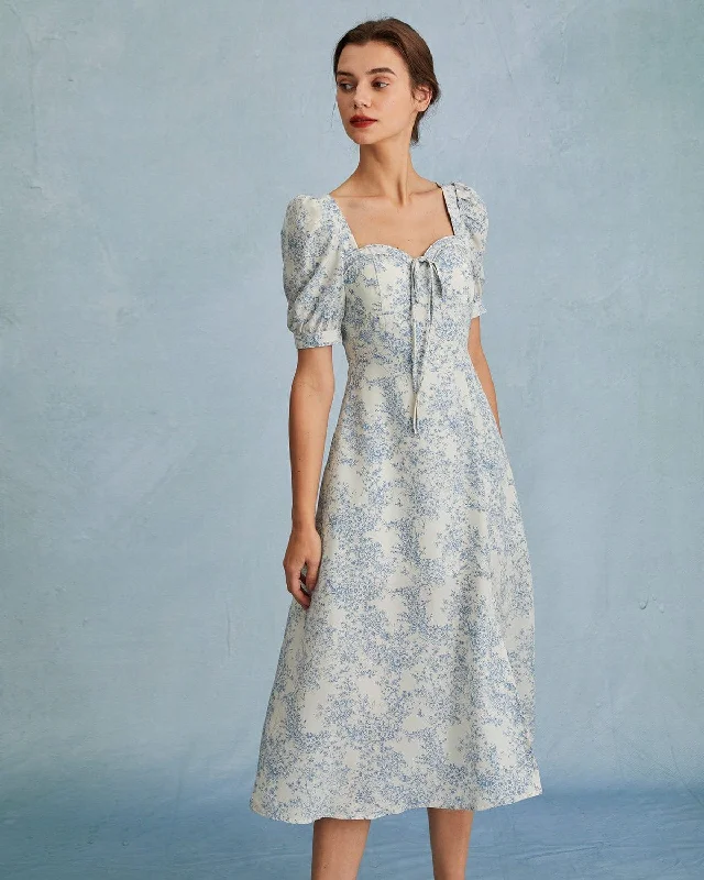 Midi dresses with asymmetric hems for a fashion - forward and dynamic appearanceThe Blue Sweetheart Neck Puff Sleeve Floral Midi Dress