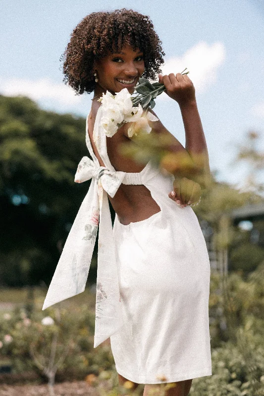 Mini dresses with spaghetti straps for a delicate lookTai Bow Back Mini Dress - White Floral