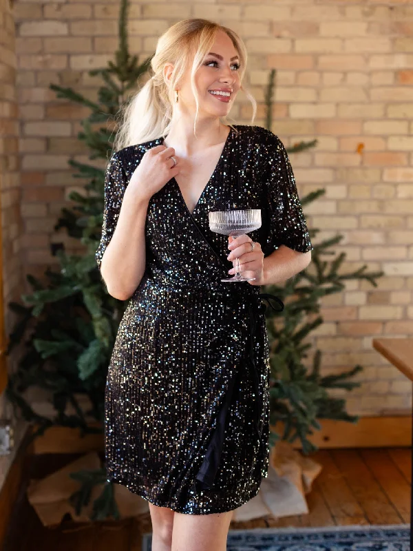 Prom dresses with tiered ruffled sleeves and satin skirts for a feminine and voluminous lookHalf Flutter Sleeve Sequin Wrap Dress Prom dresses with tiered ruffled sleeves and satin skirts for a feminine and voluminous lookHalf Flutter Sleeve Sequin Wrap Dress